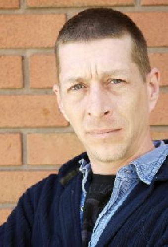 Брайан Томас